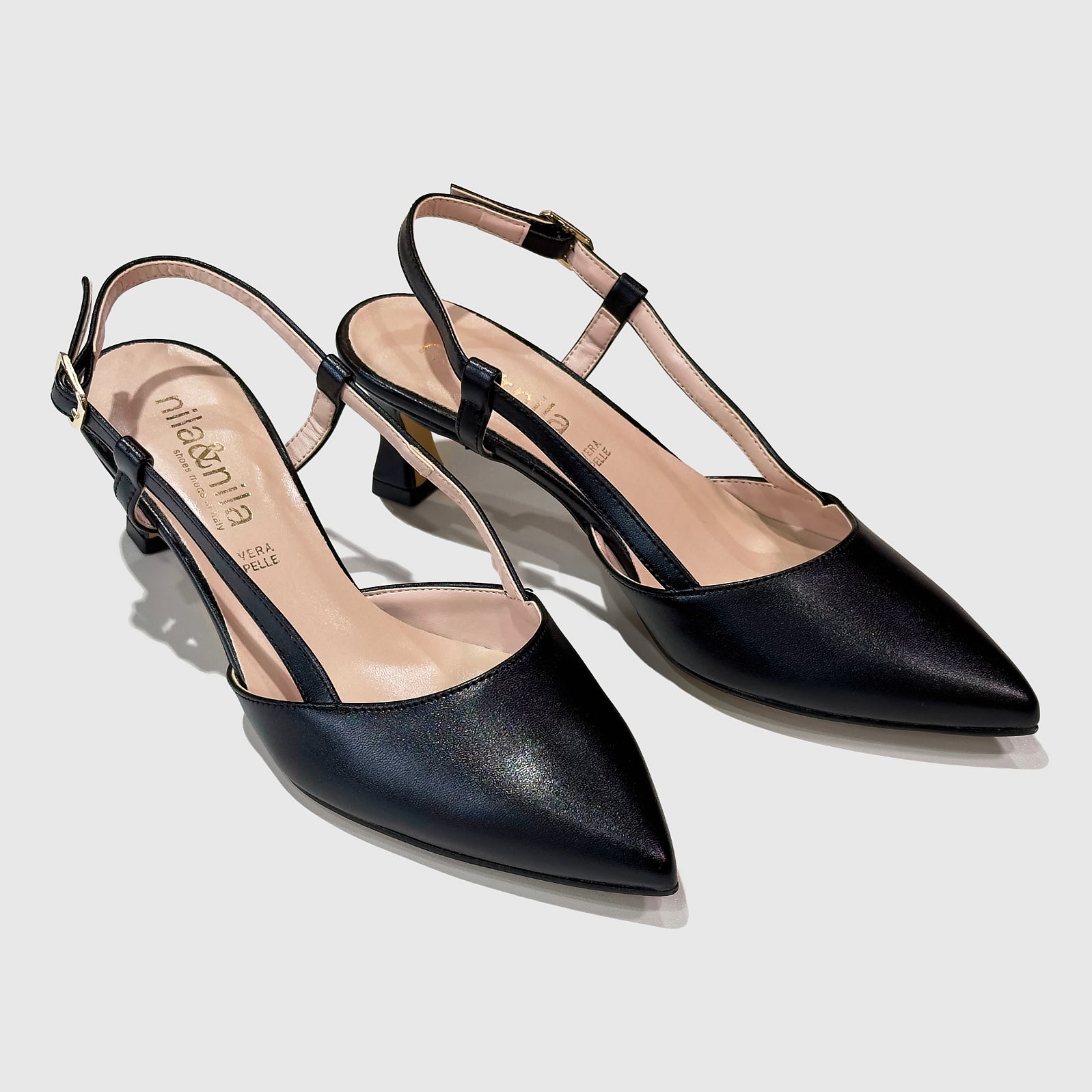 Zapato medio punta corres talón negro